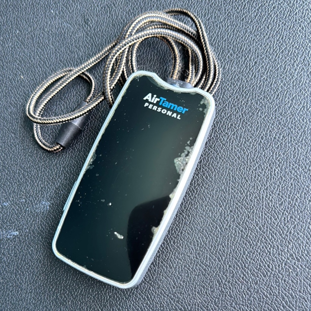 Black Wearable AirTamer with Sleek Design and Minimalist Aesthetic